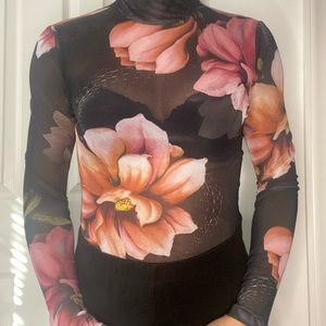 Transparent black bodysuit